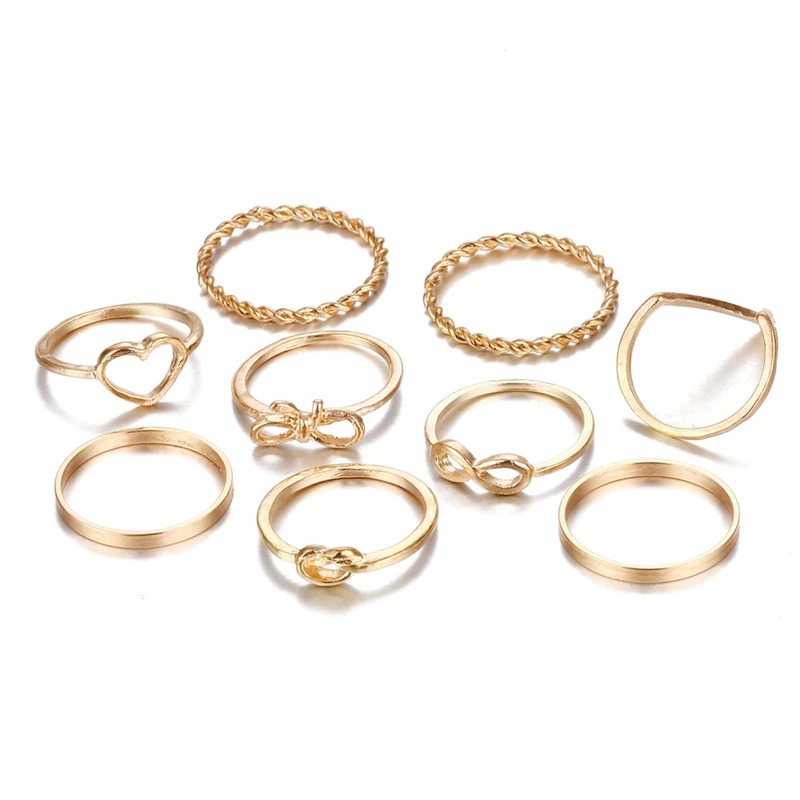 Thumbnail: Gold Round Geometric Ring Set Cross, Twist, Open Ring, Joint Ring