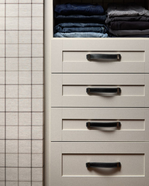 Custom dresser with black hardware and tailored storage details