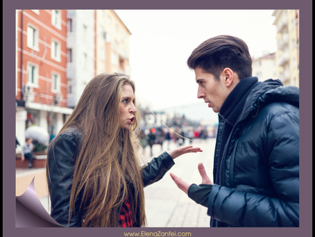 A woman passionately arguing with her partenr