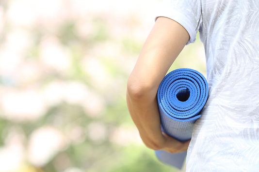 Beth Cosi Yoga_woman with mat-2.jpeg