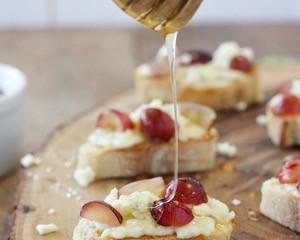 Image of Gorgonzola, Grape and Honey Crostini from Litehousefoods.com
