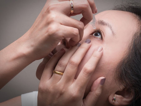 woman puts eye drops for dry eyes