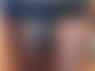 Stainless steel dishwasher with control panel, granite counter, and dumbbells. 