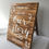 Thumbnail: Wooden “Our Story” Sign