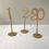 Thumbnail: Gold Stand Wood Table Number Set
