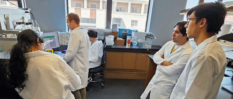 Kimmunity Lab members in action—focused at the LNP station where high-throughput formulation meets serious science.