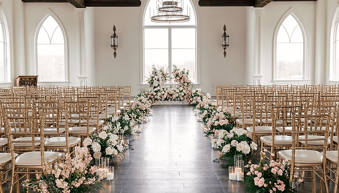 Soft pastel ceremony with gold chairs and white florals at The Park Savoy