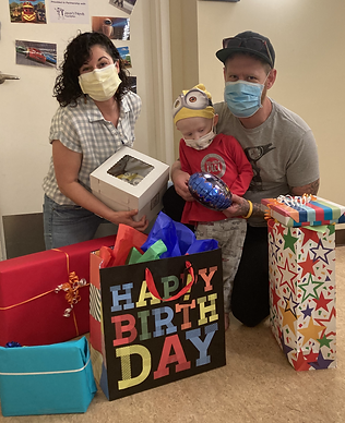 Logan + Family with Cake and Presents.jpg