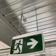 Exit and emergency lighting system installed by a licensed electrician