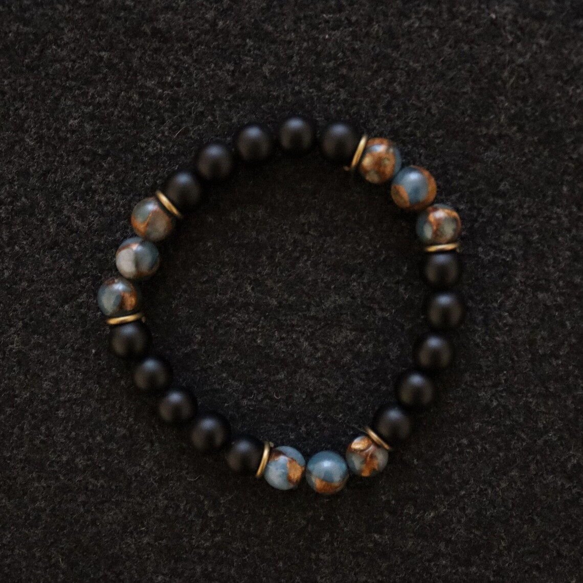 top view of men onyx and hematit bracelet