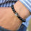Thumbnail: view of the  Onyx and Cube Sodalite Balance bracelet on the wrist