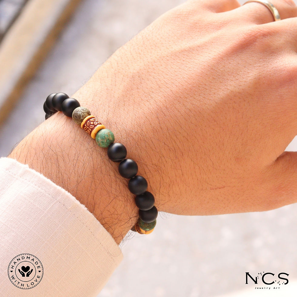 Thumbnail: Men's bracelet made of very high quality Tibetan agate and matte black onyx stones on the model's wrist