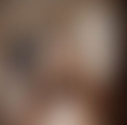 Fashion sales representative using a tradeshow order booking app on a tablet to capture retailer orders in real time at a fashion tradeshow.