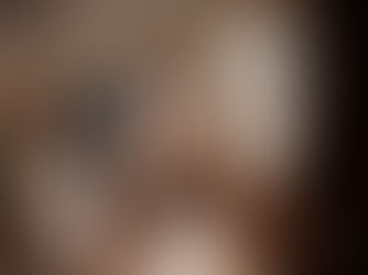 Fashion sales representative using a tradeshow order booking app on a tablet to capture retailer orders in real time at a fashion tradeshow.