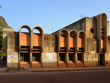 Treasury building in Guinea-Bissau symbolizing regulatory oversight, highlighting the importance of ARN Type Approval (Declaração de Conformidade) for telecom and ICT equipment certification.
