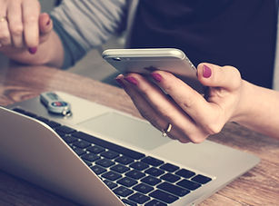 woman holding an iphone_edited.jpg