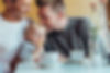 People and baby eating