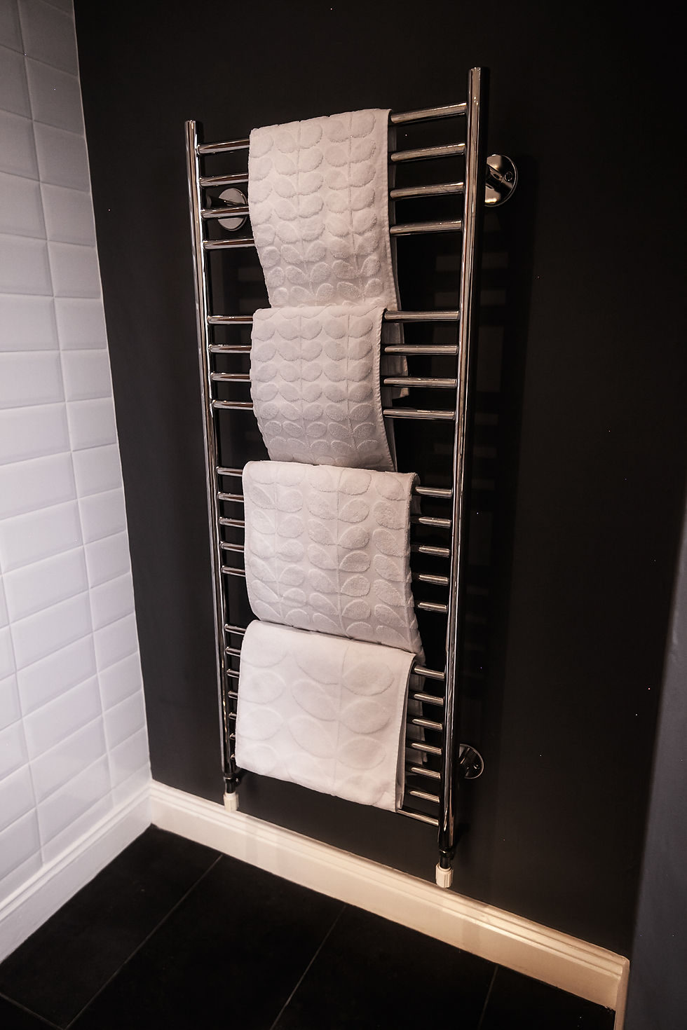 Neat towels and metro tiles