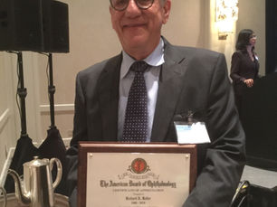 Goldfeller Volunteer Service Award Presented to Two Longtime Examiners