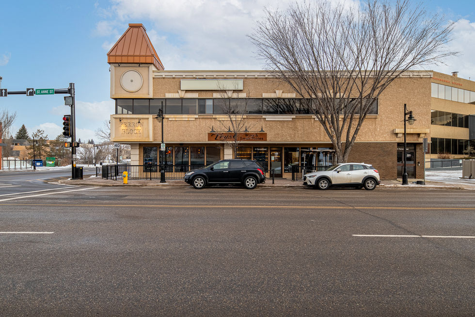 side view of iconic building, with clock tower, at Perron Street and St Anne Street in downtown St Albert, AB