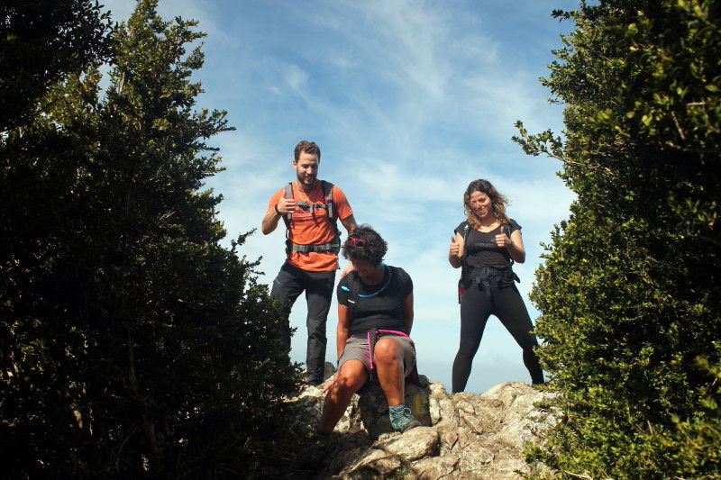 Thumbnail: three friends playing on a hill