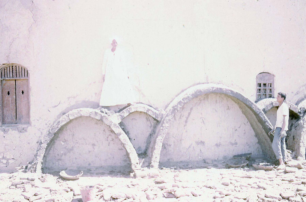man standing on the dome part of Hassan Fathy team