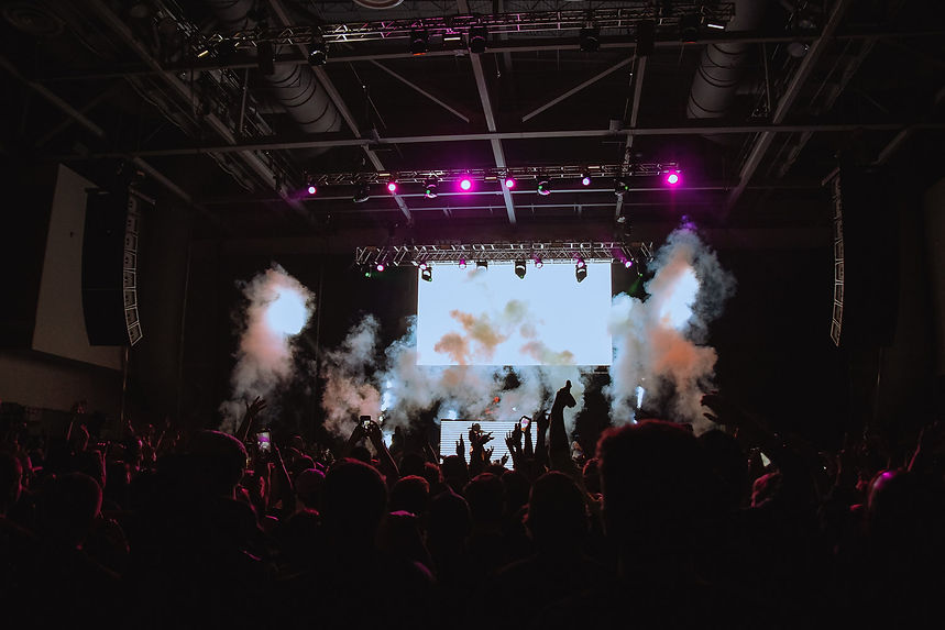 An image depicting a large IUP Homecoming concert of 5,000 students