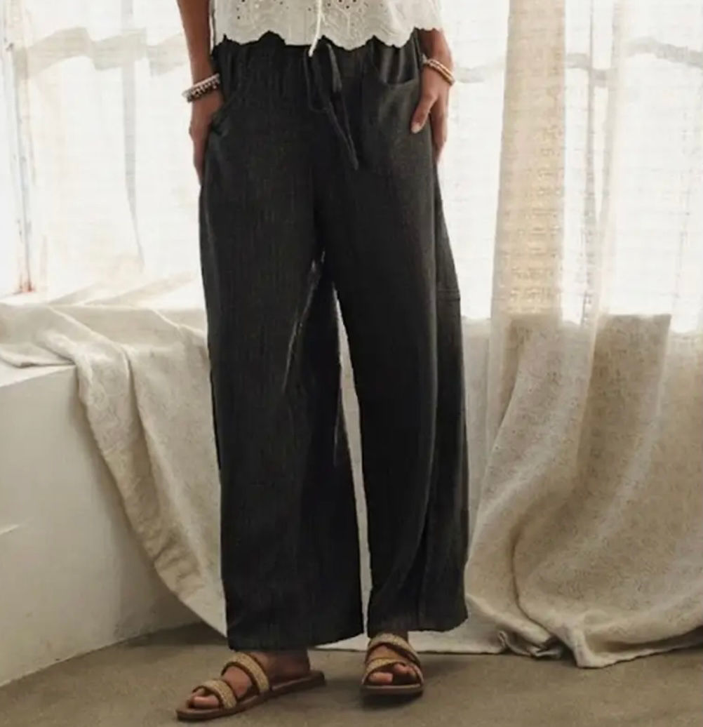 Sandy’s Black Striped Pants