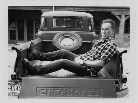 Bruce Springsteen in back of a truck