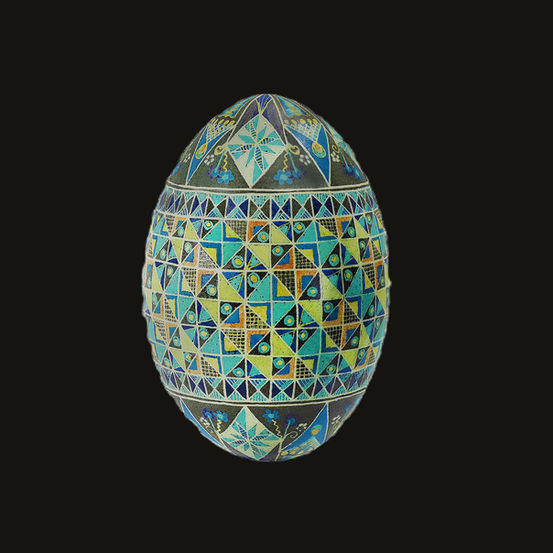 swan eggshell with blues and greens in geometric patterns across belly of shell