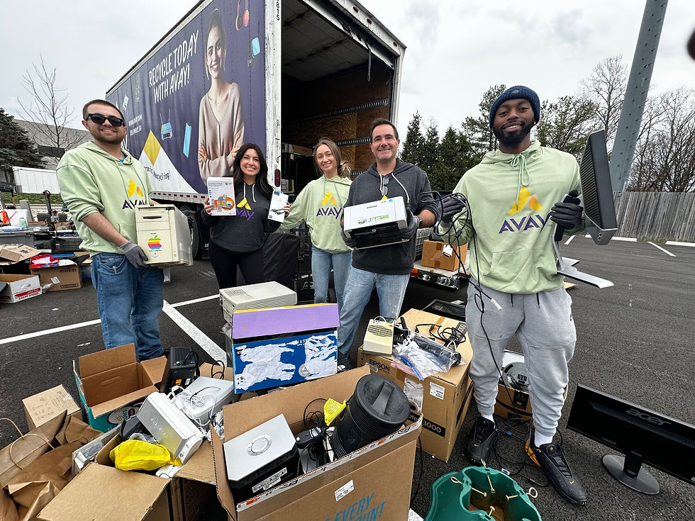 A group of people filling a recycling truck