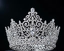 on an black background I need a photo of a sparkling elaborate silver pageant crown.jpg