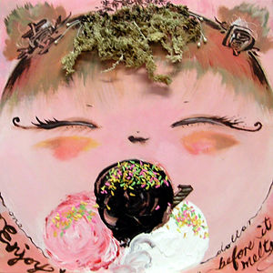Mixed-media artwork titled Friendly Liu, featuring a close-up painted portrait of a child with closed eyes and rosy cheeks, eating a large scoop of dark ice cream covered in colorful sprinkles, flanked by pink and white scoops; the piece incorporates actual dried green moss and twine as hair, with the handwritten text 'before it melts' and 'Friendly Liu' painted along the edges.