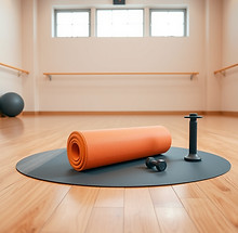 Yoga mat, foam roller, and dumbell in ballet studio, circular crop.jpg