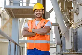 smiling-young-construction-engineer-working-in-pla-2026-01-09-00-22-25-utc.webp