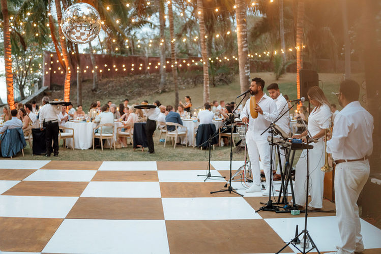 Elegant outdoor wedding reception, live music