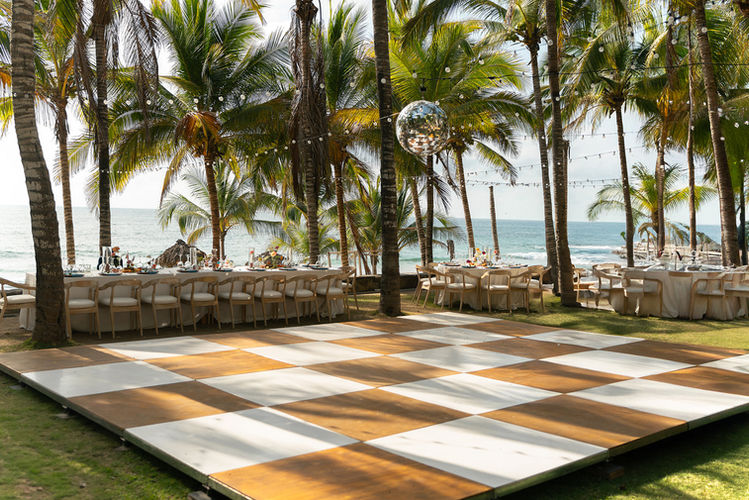 Beachfront wedding dance floor, ceremony setup