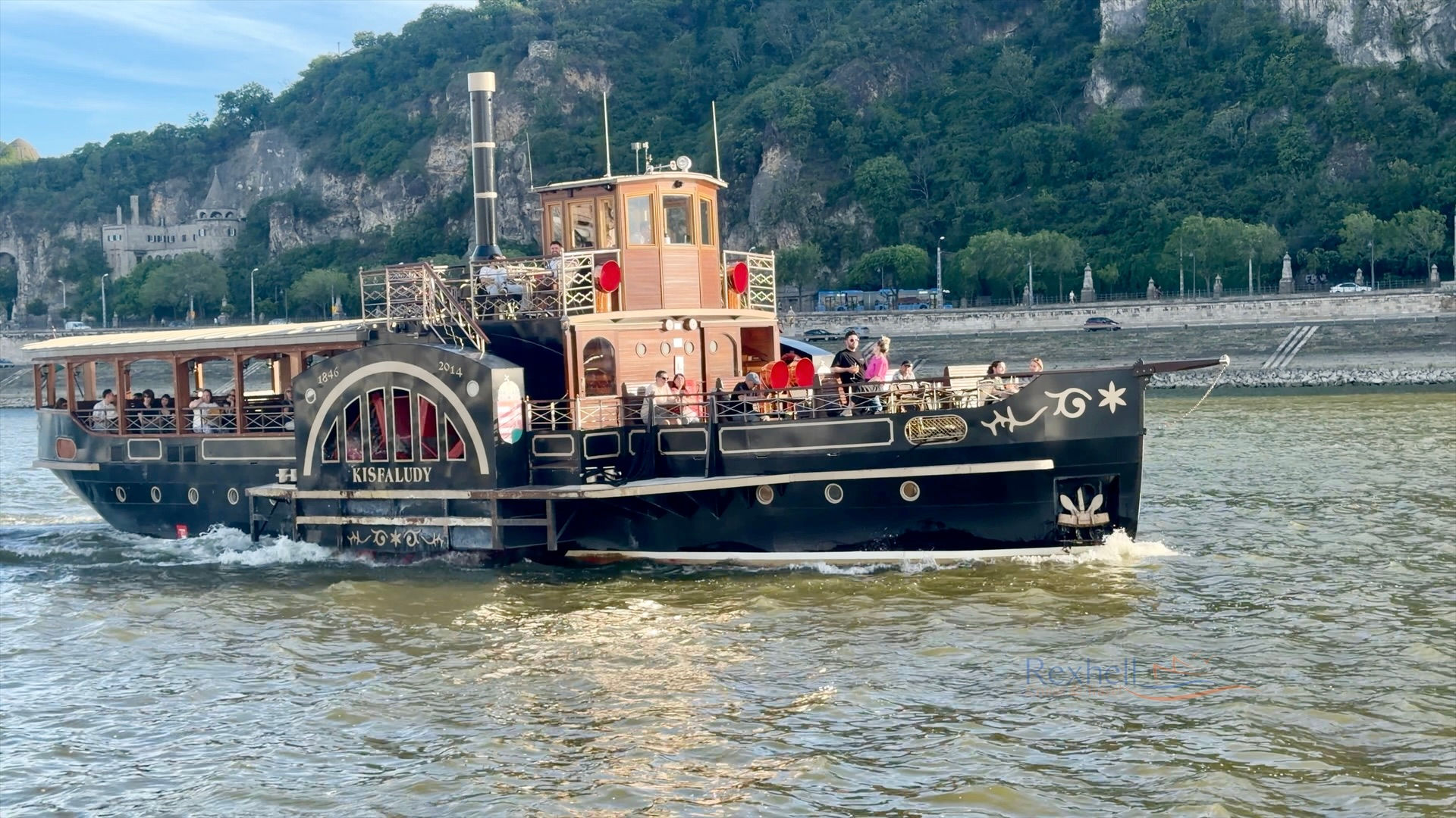 Vintage paddle steamer on a river during a VIVA ENJOY review