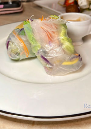 Fresh vegetable spring rolls served with dipping sauce.