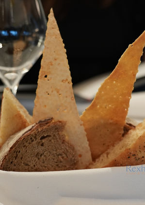 Varied bread basket at an Explora Journeys restaurant.