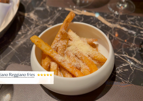 Parmesan fries in a white bowl at Explora Journeys