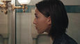 Lujza Richter looking at the mirror