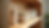 Eye-level view of organic bath products arranged on a wooden shelf