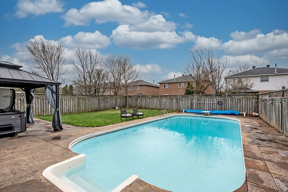 Backyard with swimming pool and gazebo