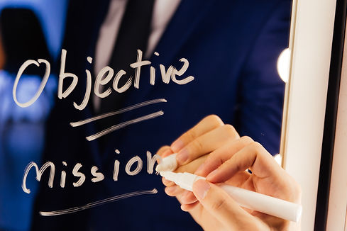 smart-business-man-writing-the-word-objective-miss-2022-01-28-03-47-02-utc.jpg