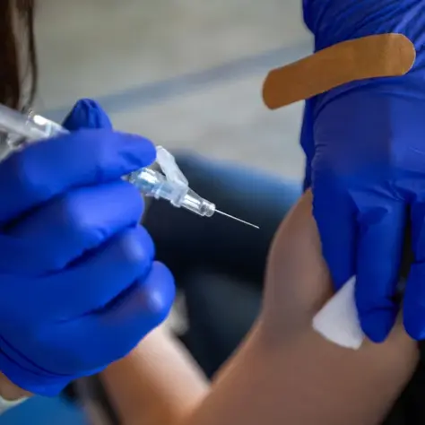 After four years with COVID-19, the US is settling into a new approach to respiratory virus season 