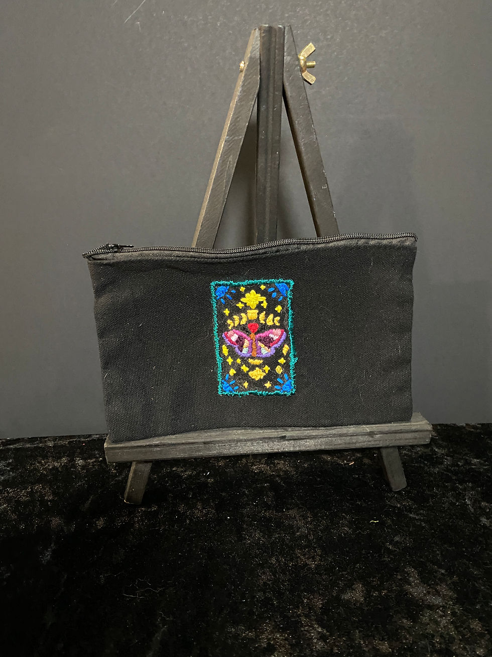 Thumbnail: embroidered make up bag