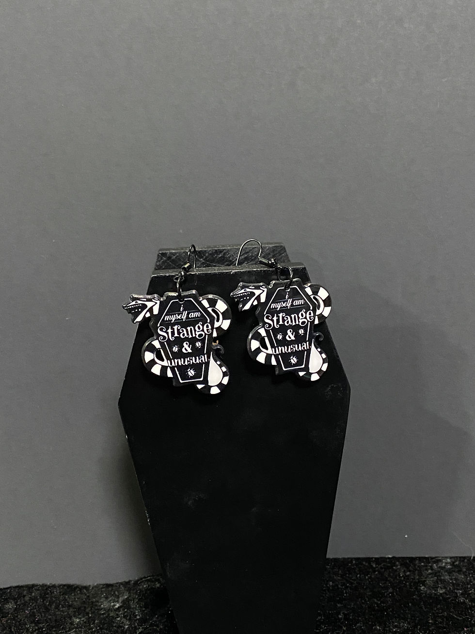 Thumbnail: beetlejuice sandworm earrings