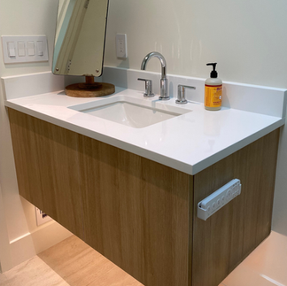 modern bathroom with quartz countertop on floating vanity
