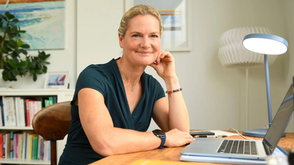Dr Sophie Bostock at her desk